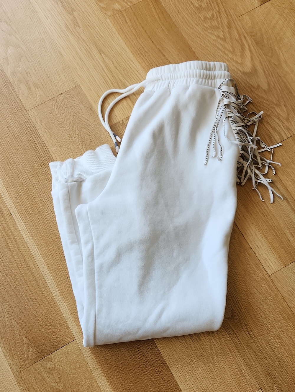 The Post  White Elastic Waist Sweatpants With Rhinestone Fringe